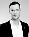 Jan André Hansen, divisjonsdirektør i Humana omsorg og assistanse, sier de har valgt ikke å være den dyreste leverandøren.