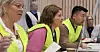 Hilde Johnsen, Kjersti Knudsen og Quan Tran tar imot beboere som står uten hus og klær.